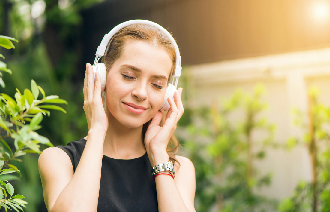 Photo by Tirachard Kumtanom: https://www.pexels.com/photo/woman-wearing-black-sleeveless-dress-holding-white-headphone-at-daytime-1001850/